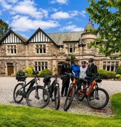 Alison, Brian, Pam and Ian Cycling on the  tour with redspokes